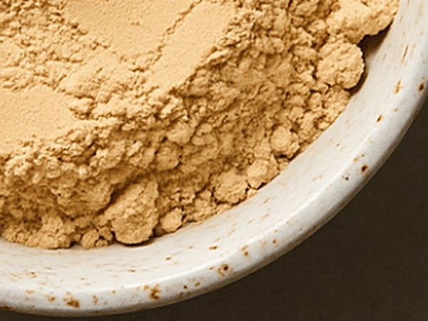 Caramel Biscuit egg white powder in a bowl
